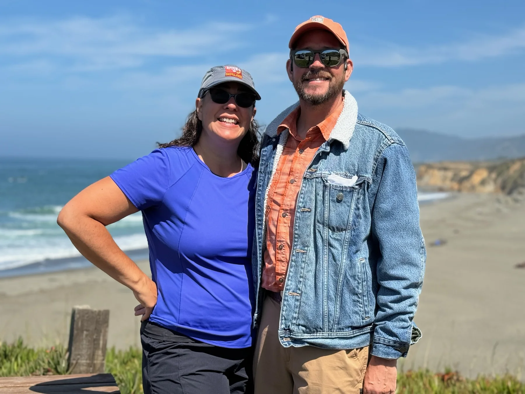 Krista and Randall Stone standing on the California coast